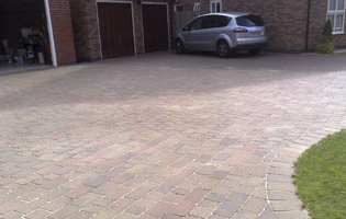 the driveway is restored back to its former glory